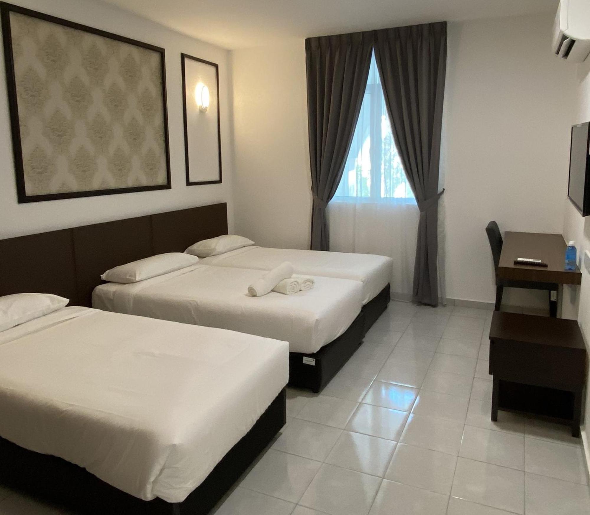 Deluxe Triple Room